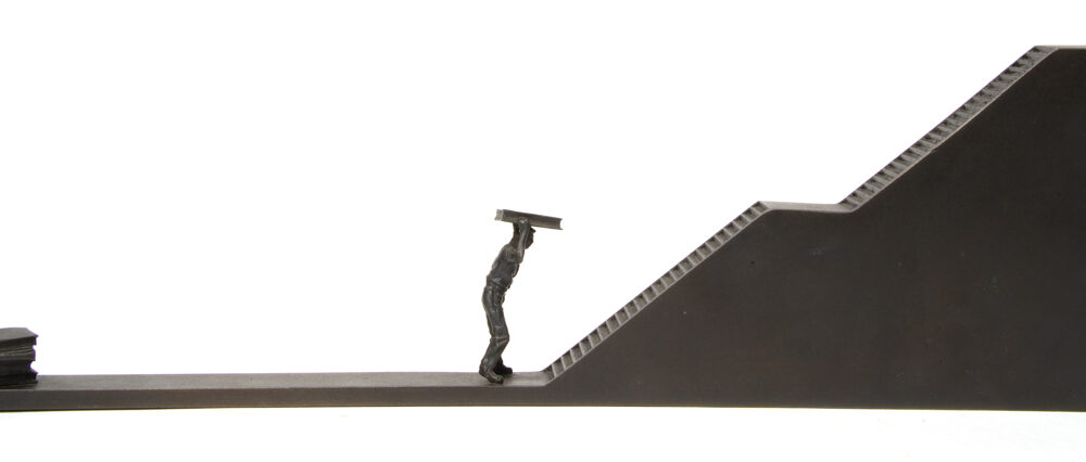 Untitled (man carrying book and stairs)