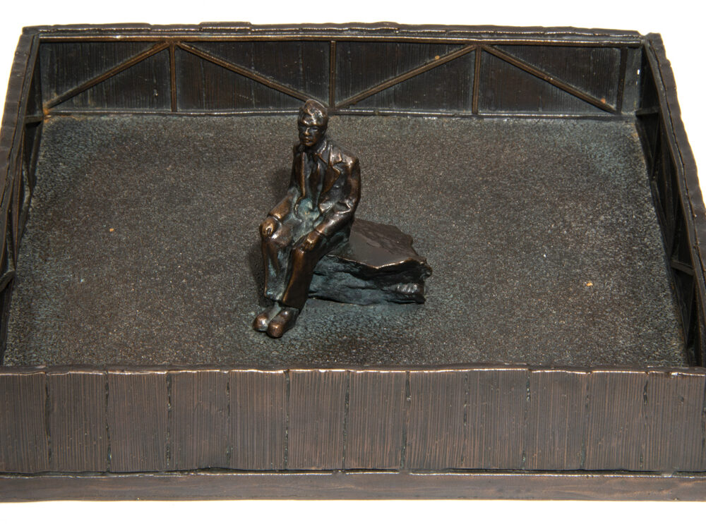 Untitled (seated man in enclosure)